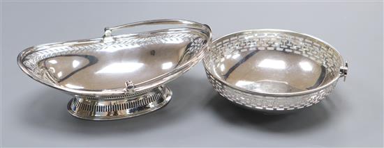 A George V pierced silver circular bonbon basket by Asprey & Co, London, 1913 and a similar Victorian oval basket, London, 1880.